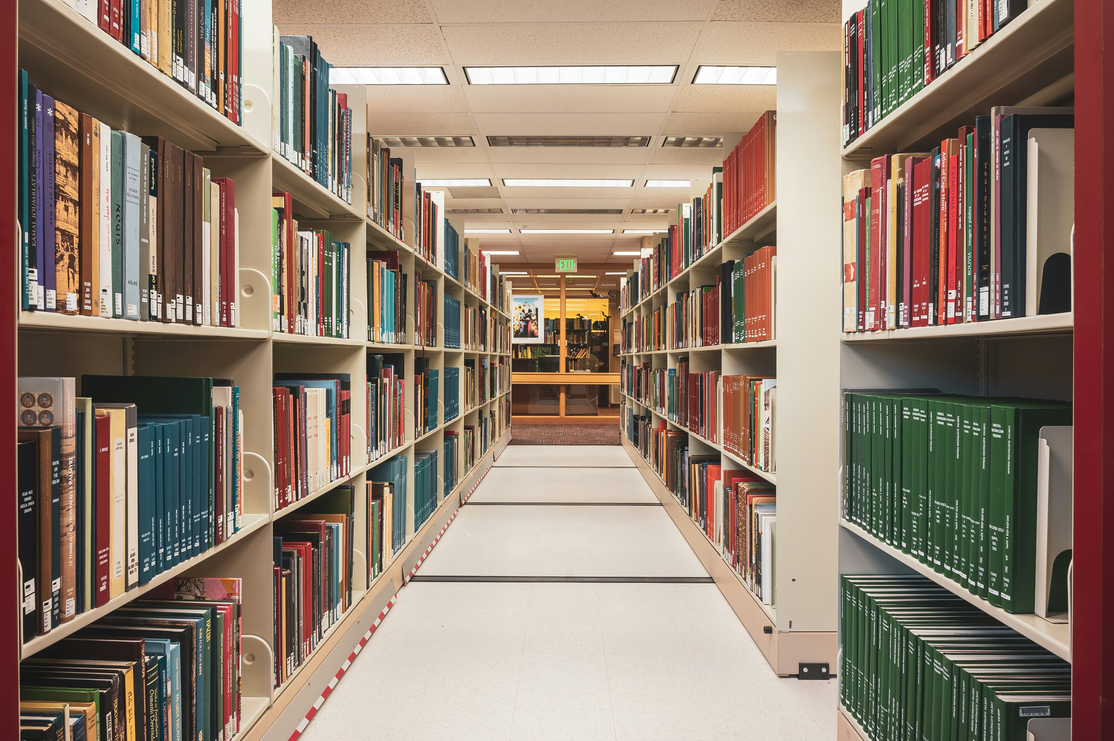 Library shelves with books